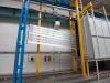 Part entering pre-treatment booth