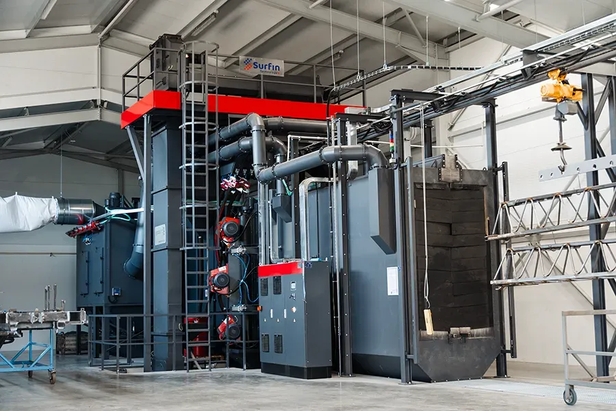 Continuous and overhead shot blasting machine