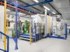 Powder coating line with robotic application