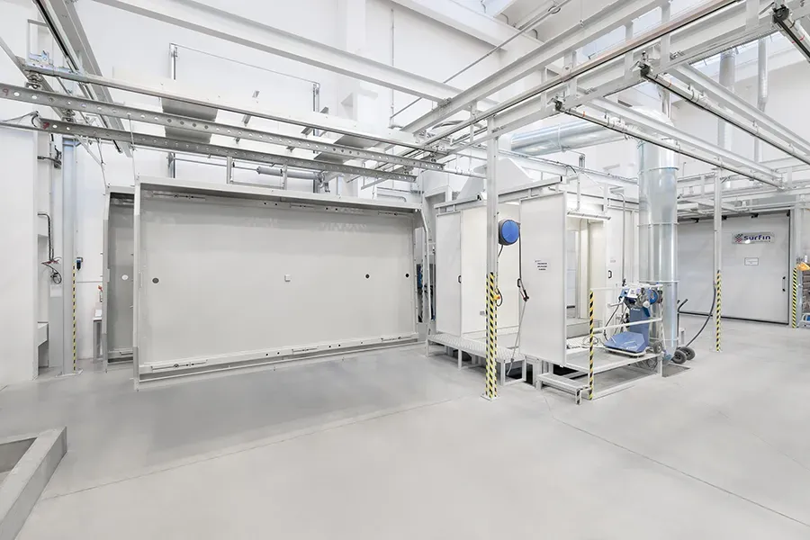 Parts hanging on conveyor
