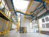 Overhead conveyor in coating line