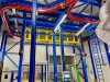 Overhead conveyor in coating line