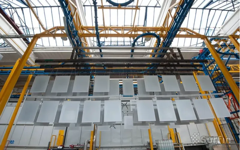 Parts hanging on conveyor at Albixon