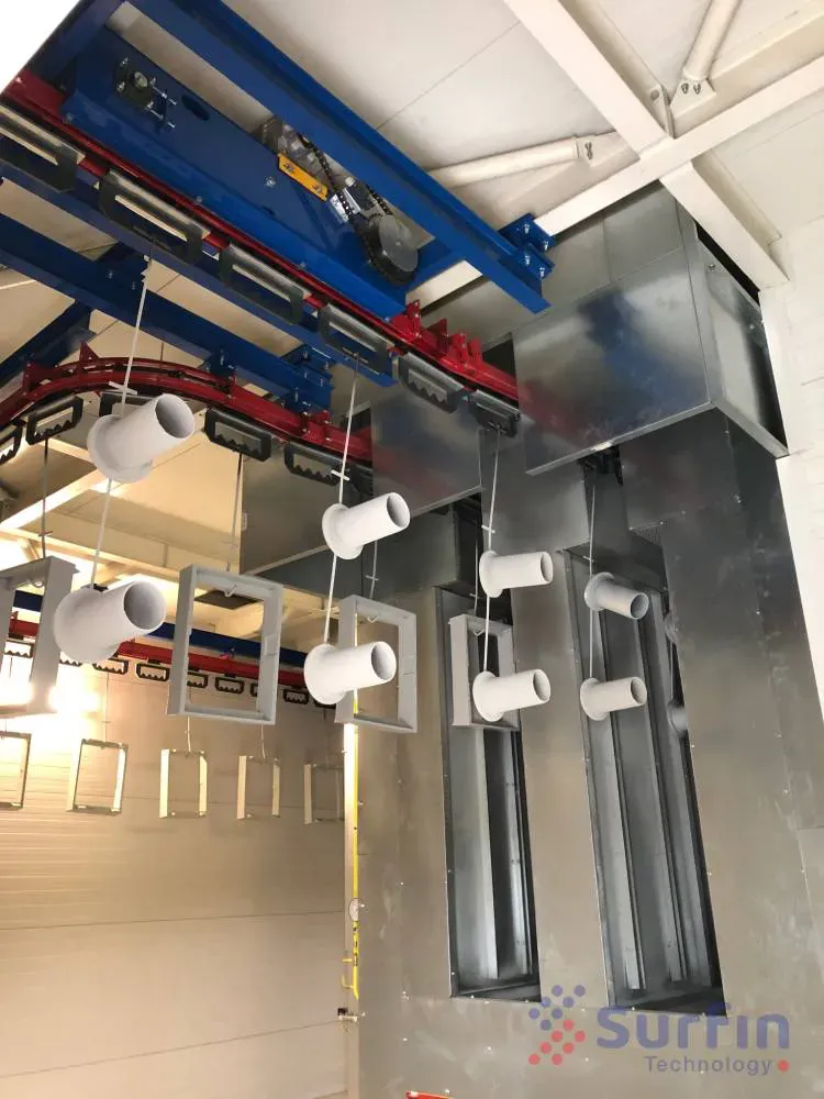Metal parts on an overhead conveyor