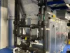 Black pipes connected to equipment 