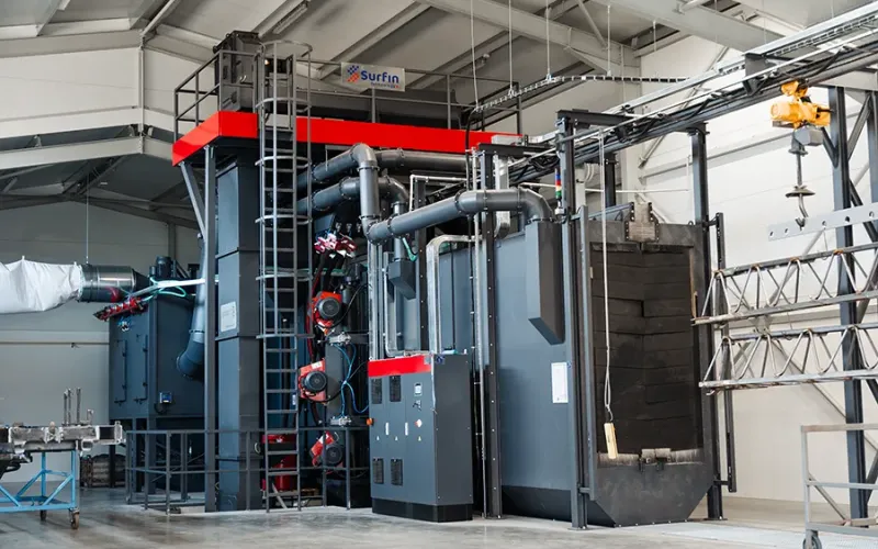 Continuous and overhead shot blasting machine