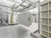 Metal parts on manual conveyor