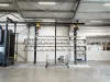 Loading station with two hanged metal parts