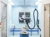 Robotic flame treatment station