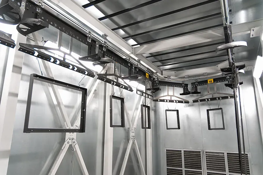 Drying oven interior with hanged metal parts