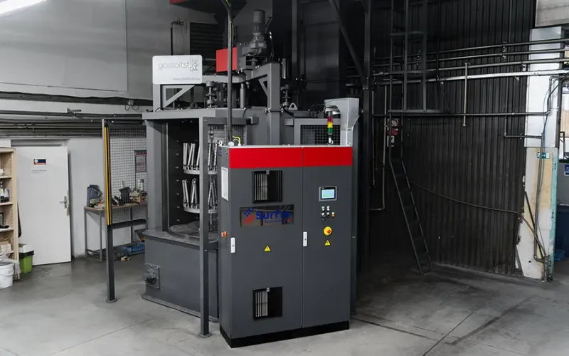 Three-chamber carousel blasting machine