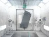 Coated metal part inside coating booth