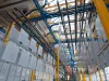 Parts hanging on overhead conveyor