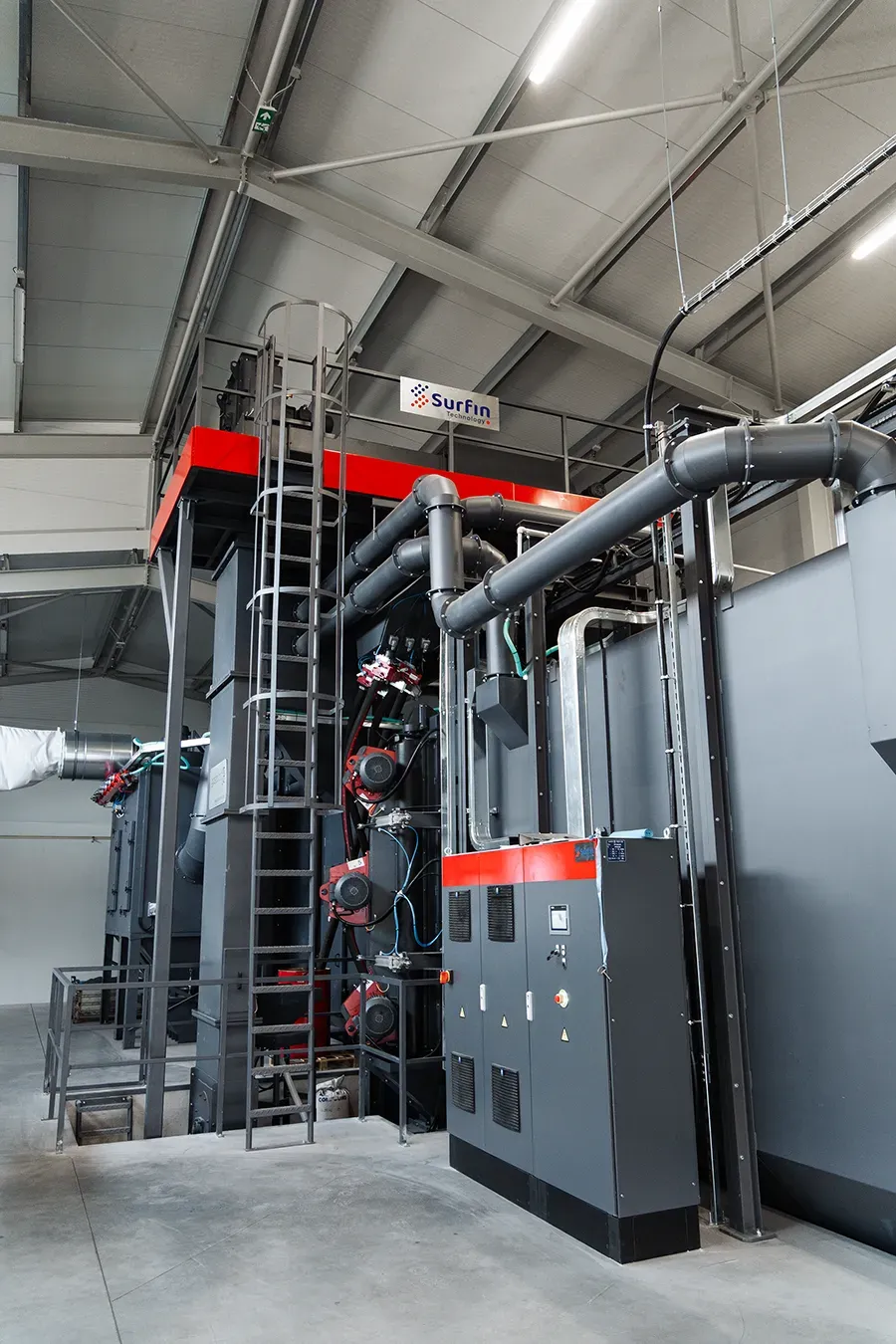 Blasting machine with blasting wheels