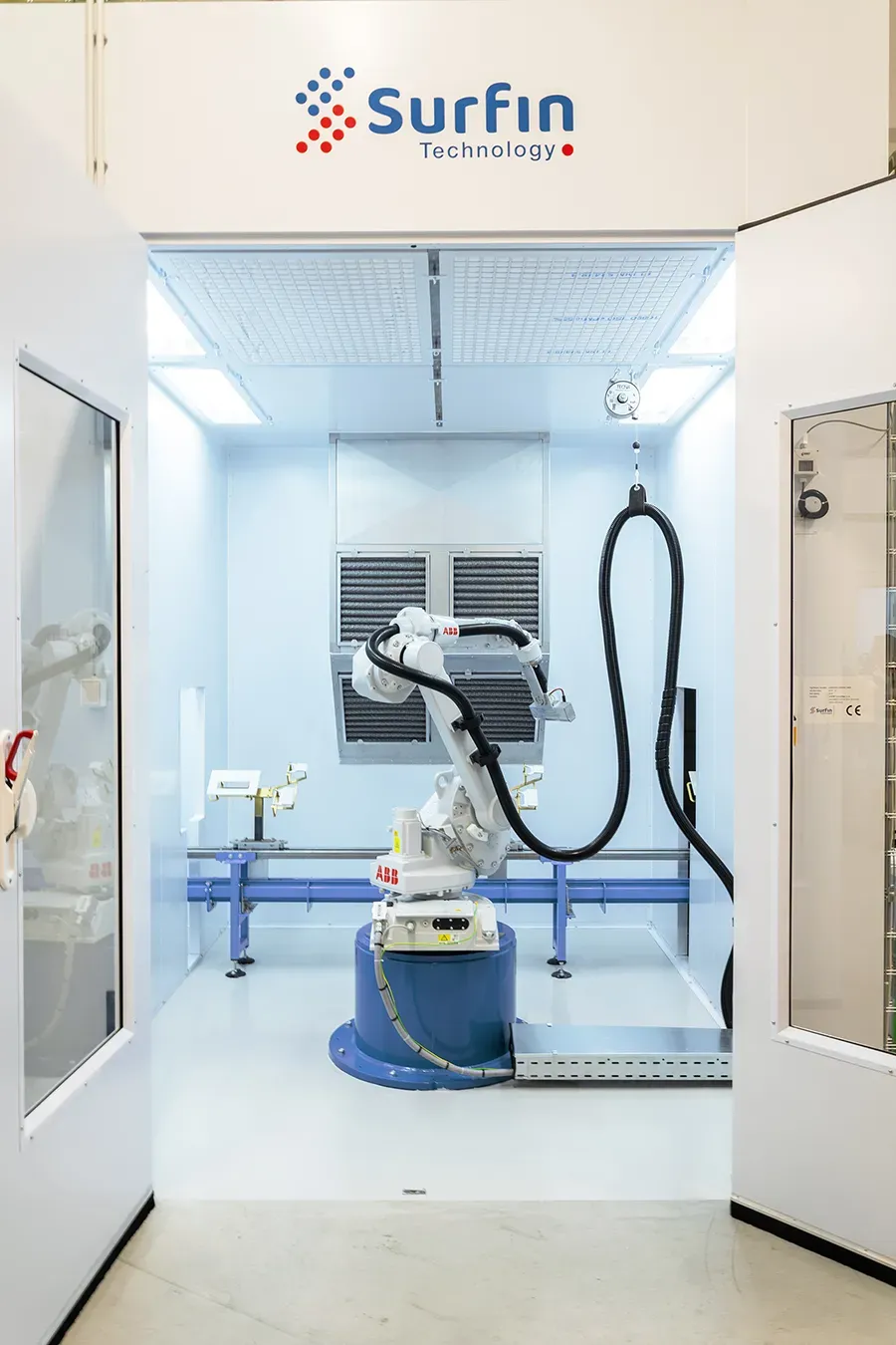Robotic flame treatment station