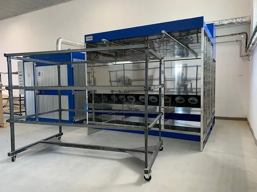 Powder coating booth with parts hanger