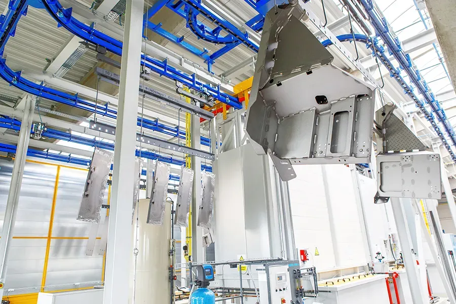 Metal parts leaving two-stage pre-treatment