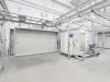 Parts hanging on conveyor