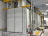 Four-stage two-chamber spray pre-wash