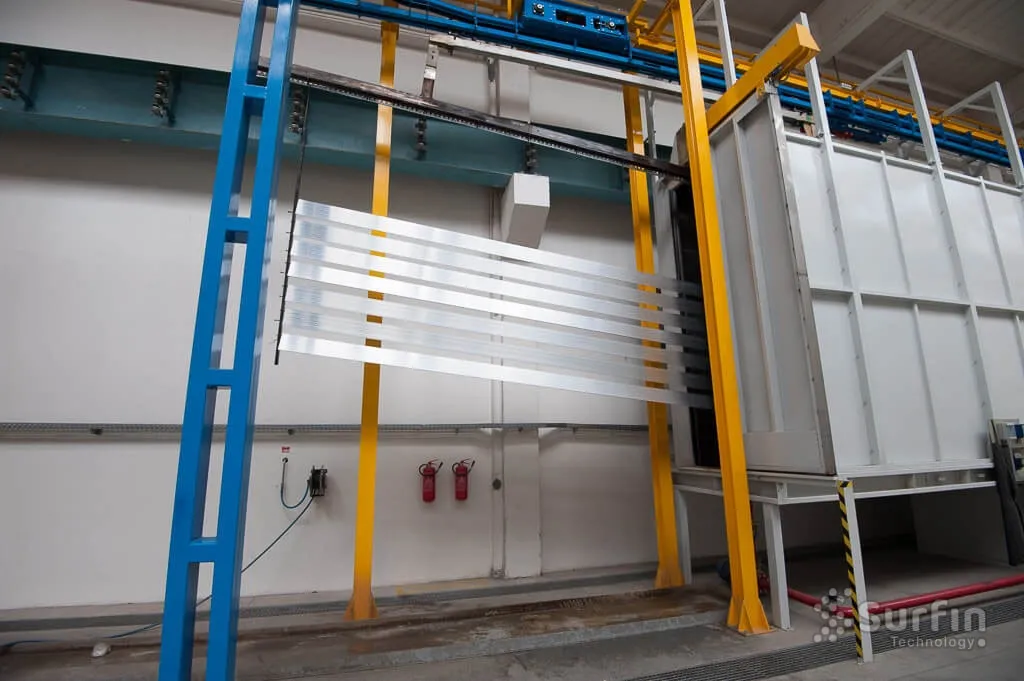 Part entering pre-treatment booth