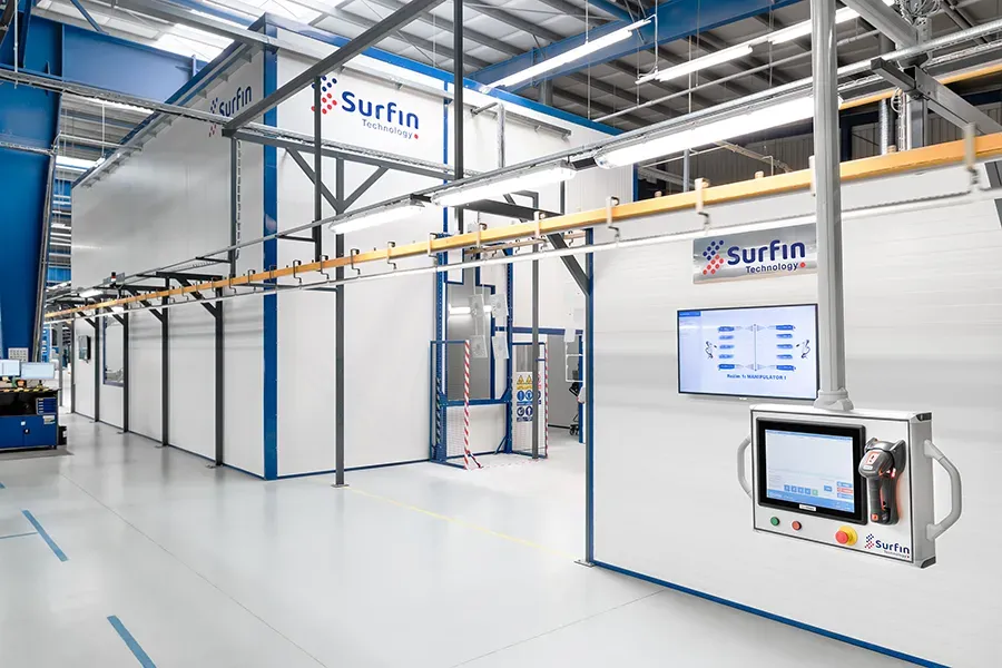Coating line with overhead conveyor