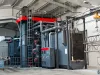Continuous and overhead shot blasting machine