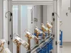 Floor conveyor with sensor gate